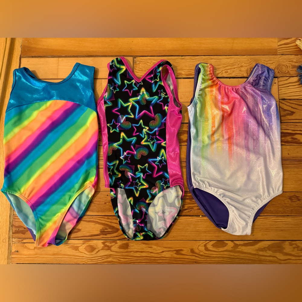 Lot of 3 gymnastics leotards. Sz 130 CM